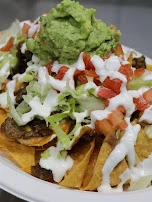 Shredded Lettuce Guacamole Corn Chips